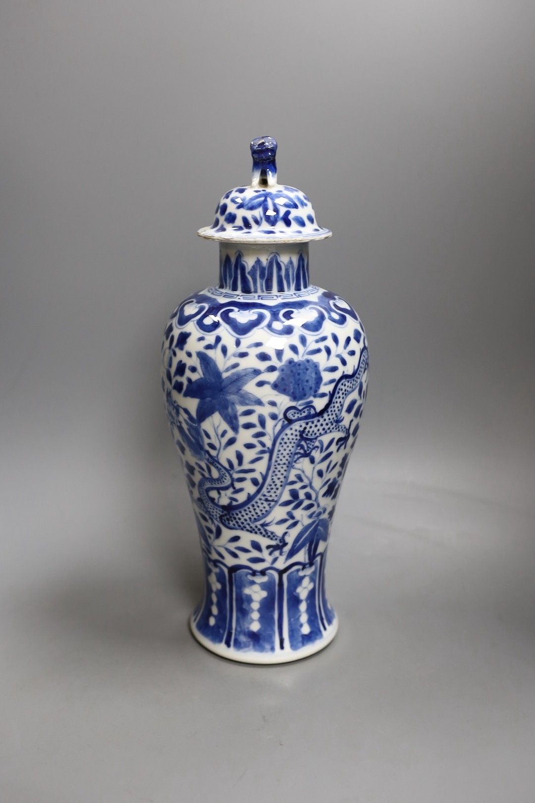 A Chinese blue and white 'dragon' vase and cover, Kangxi mark but 19th century. 33cm